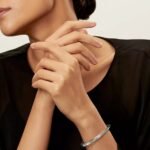 ELSIE LOVE Lock Bangle, 18K Gold Plated, V Gold, Medium Size, PVD 5x Layered - Image 10