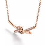 ELSIE LOVE Knot Pendant with Zirconia | V Gold 18K Gold Plated Adjustable Minimalist Necklace - Image 11